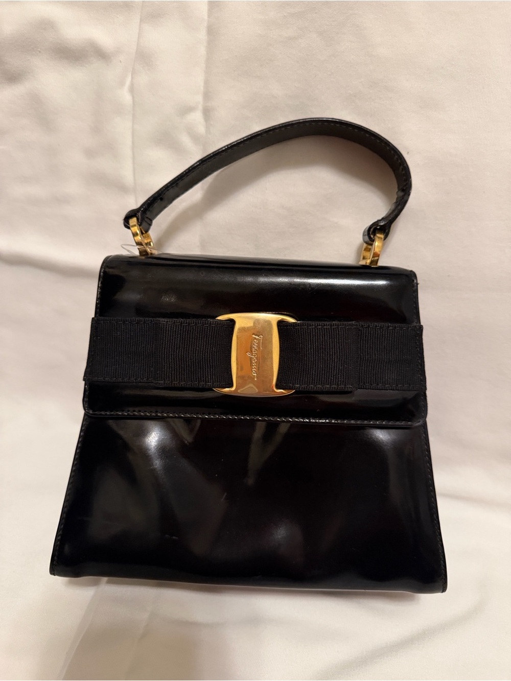 Salvatore Ferragamo Black Patent Leather Top-Handle Bag with Gold Vara Buckle
